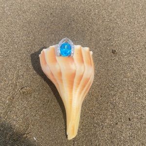Light Blue Stone With Crystals Pendant